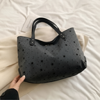 Sac design avec étoiles perforées